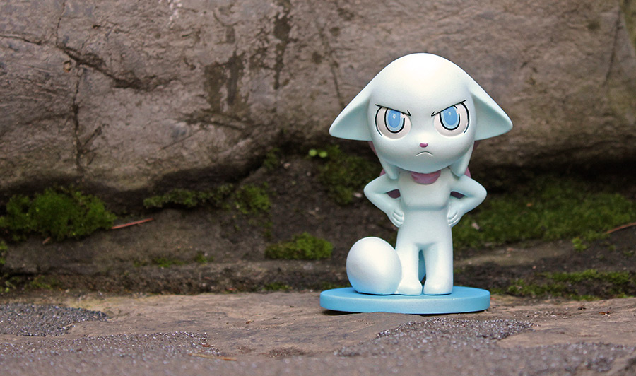 Front view of Lucy figurine on some steps